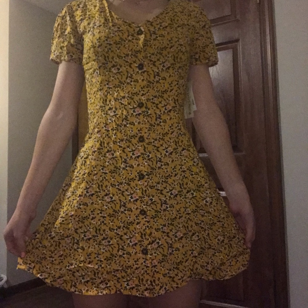 Super cute and flowy yellow flower button up dress